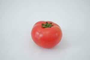 tomato on a white background, close-up, isolated. photo