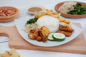 Thai food with rice, fried tofu, shrimp paste, sweet and sour sauce photo