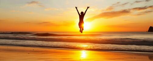 Sunrise over a beach with a person jumping photo