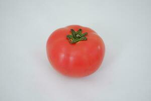 tomato on a white background, close-up, isolated. photo