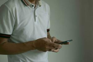 phone, smartphone, chatting, working and taking notes Man using mobile photo