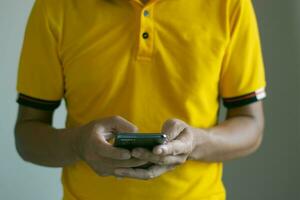 Man using mobile phone chatting on wireless network, business concept design photo