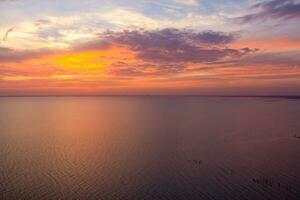 mobile bay at sunset in daphne, alabama photo