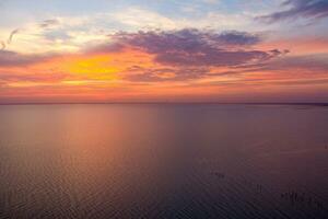 mobile bay at sunset in daphne, alabama photo