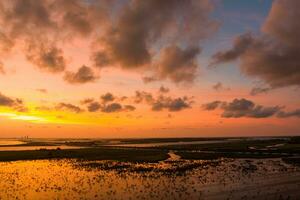 Beautiful sky at sunset over Mobile Bay, Alabama photo