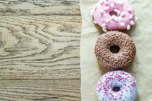 Colourful donuts arranged in a row photo