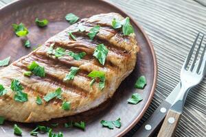 Grilled turkey breast with parsley photo