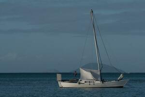 A yacht setting sail photo