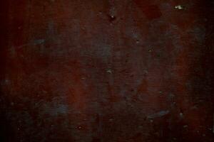 Old dark red rusty metal panel background texture photo