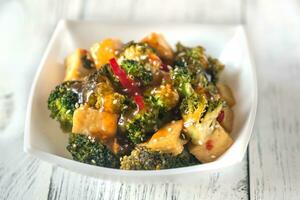 Tofu and broccoli stir-fry photo