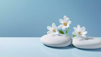 A minimalistic scene of a lying stone with flowers on a light blue background. Showcase for the presentation of natural products and cosmetics. photo