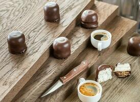 Fresh marshmallows with two cups of coffee photo