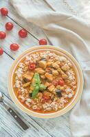 Thai red chicken curry with white rice photo