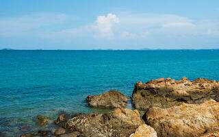 landscape view summer blue sea calm wave. wind blows cool And still see rock distance still island And sky clear look relaxed. Suitable relax travel Khao Leam Ya National Park Rayong Thailand Pacific photo