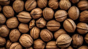 Realistic photo of a bunch of walnuts. top view nuts scenery.