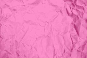 Pink crumpled paper texture halftone background vector illustration