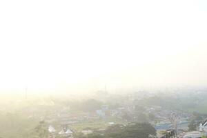 The view of the sunrise in the middle of the city seen from above, photo