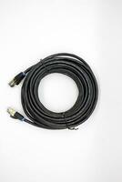 Black internet cable neatly rolled up photo