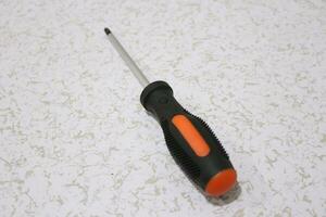 Close-up of an orange screwdriver photo