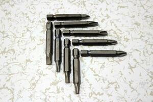 A close-up of screwdriver bits photo