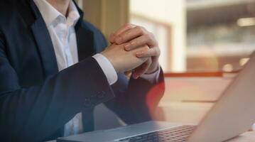 Hands of a thoughtful, hr recruiter making hiring decision at difficult job interview, opponents dialogue debate, business confrontation challenge concept, pray hope and negotiation business dealing photo
