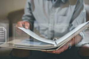 businessman holding files folder  in Document data system Report HR technology Concept, data analysis, research and development photo