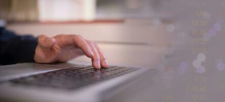 Businessman hands typing on laptop computer keyboard, surfing internet working in business concept.SEO, Search Engine Optimization, analysis financial data report, investment strategy and planning photo