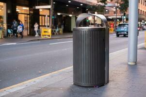 trash, garbage bin on street in city Sydney Australia photo