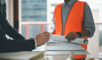 project management, businessman and contractor discussion on data or project plans and workflow, architecture or engineer meeting with businessman photo