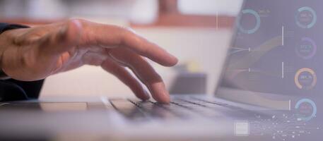 Businessman hands typing on laptop computer keyboard, surfing internet working in business concept.SEO, Search Engine Optimization, analysis financial data report, investment strategy and planning photo