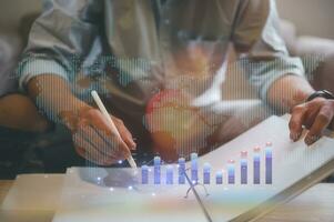 Analyst working with Business Analytics and Data Management System on computer, make a report with KPI and metrics connected to database. Corporate strategy for finance, operations, sales, marketing. photo