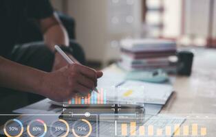 Analyst working with Business Analytics and Data Management System on computer, make a report with KPI and metrics connected to database. Corporate strategy for finance, operations, sales, marketing. photo