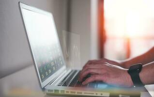 businessman typing on keyboard with virtual document data chart in Document data system Report HR technology Concept, data analysis, research and development, stock market financial investment plan photo