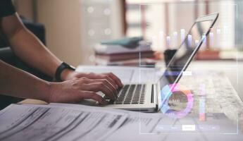 businessman typing on keyboard with virtual document data chart in Document data system Report HR technology Concept, data analysis, research and development, stock market financial investment plan photo