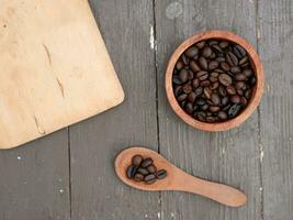 top view of coffee beans in wooden container photo