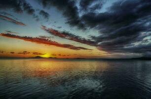 Tropical sea sunset tree sky view background photo