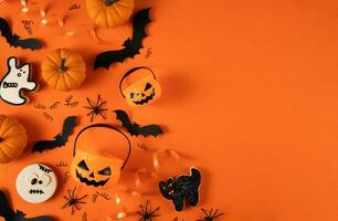 Happy Halloween banner or party invitation background with clouds bats and pumpkins photos