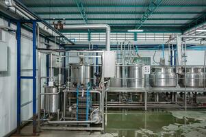 Beverage processing plant manufacture with stainless boiler tanks, liquid pipeline and control panel photo