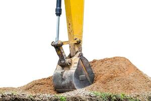 Large backhoe heavy dig soil stone photo