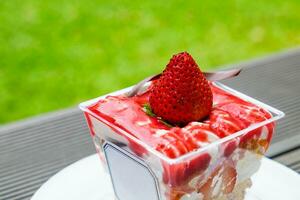 Strawberry crumble dessert cookie and cream sweet on table photo