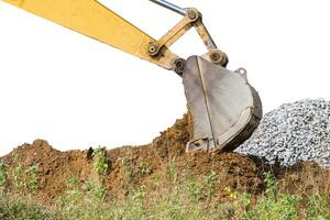 Large backhoe heavy dig soil stone photo