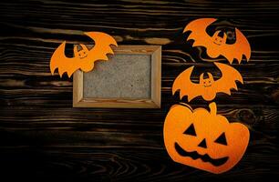 Happy Halloween banner or party invitation background with clouds bats and pumpkins photos