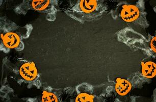 Happy Halloween banner or party invitation background with clouds bats and pumpkins photos