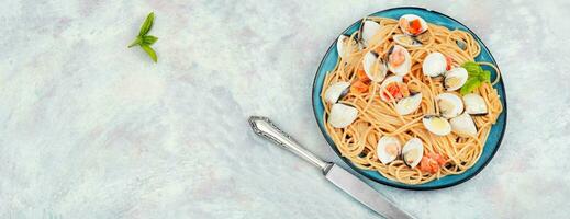 Spaghetti pasta with clams, space for text. photo