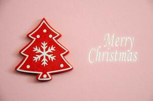 alegre Navidad. alegre Navidad tarjeta. melocotón Navidad antecedentes. coral color con el inscripción alegre Navidad. nuevo año. foto