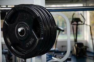 dumbbell, dumbbell in the gym. gym for fitness. exercise equipment in the gym. photo