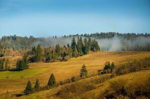 Autumn background. countryside beautiful landscape of autumn mountains photo