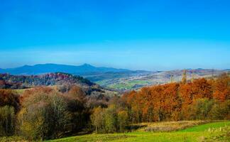 Autumn background. countryside beautiful landscape of autumn mountains photo