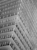 Black and white image of modern unfinished building photo