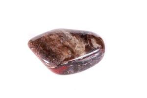 Macro mineral stone jasper on a white background photo